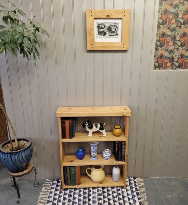 Slim Wooden Bookcase, mid height rustic wooden bookshelves with a chunky top piece, custom handmade in Somerset UK