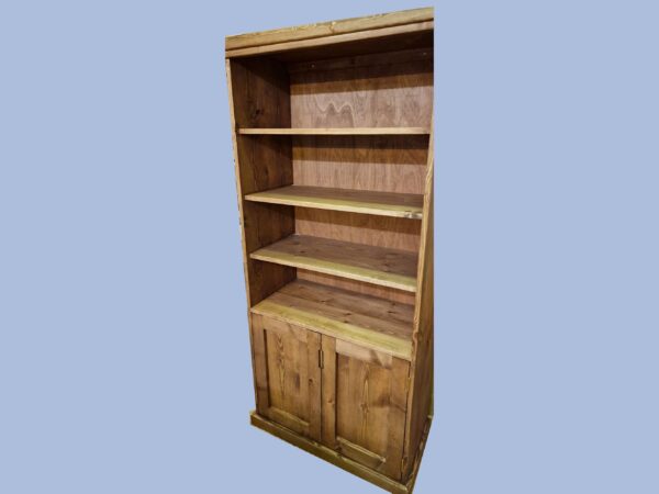 Wooden bookcase with doors bespoke handmade in Somerset UK.