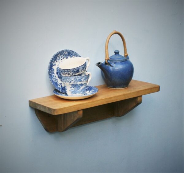 Small wooden kitchen shelf in chunky natural wood. For cookery books and plants, high view. Handmade in Somerset UK