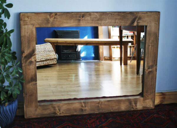 large wooden frame mirror in vintage dark wood, rustic country house style. Designs handmade in Somerset UK.