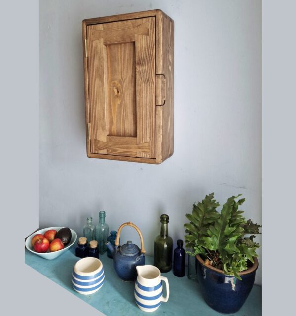 Slim dark kitchen cabinet in minimalist rustic style. Side view. Handmade from natural wood in Somerset UK.