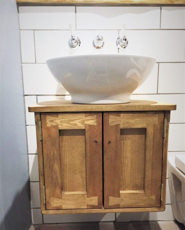 Floating sink stand vanity cabinet in natural sustainable wood, wall mounted and bespoke handmade in Somerset UK. Front view.