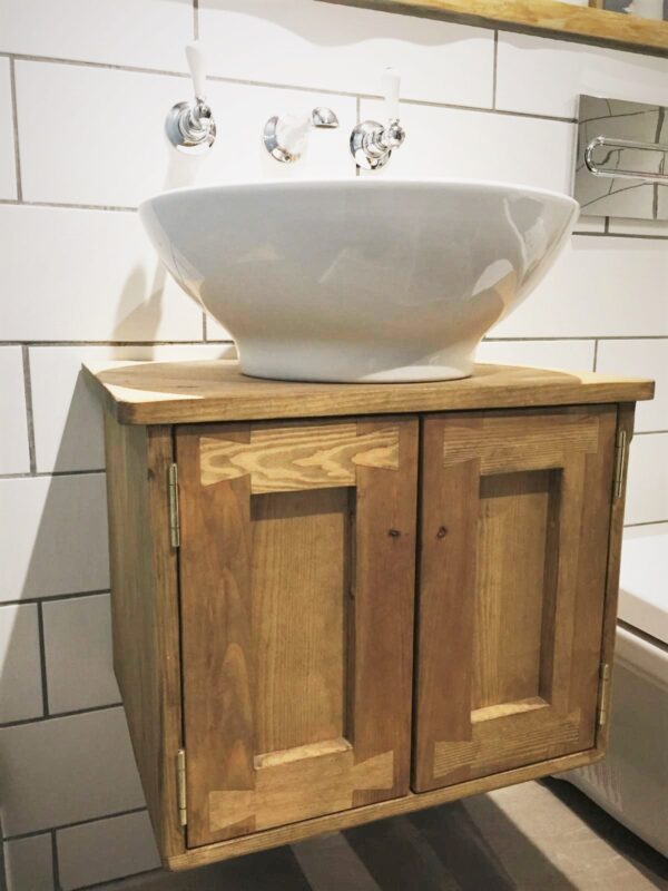 Floating sink stand vanity cabinet in natural sustainable wood, wall mounted and bespoke handmade in Somerset UK. Side view.