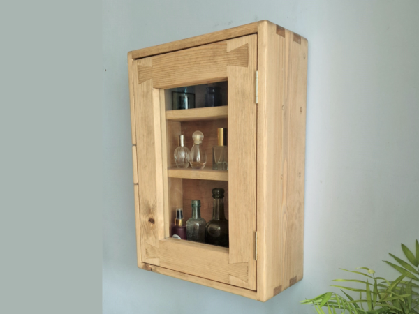 Glass door bathroom cabinet in natural wood. Minimalist rustic curio display cabinet is custom handmade in Somerset UK. Right view.