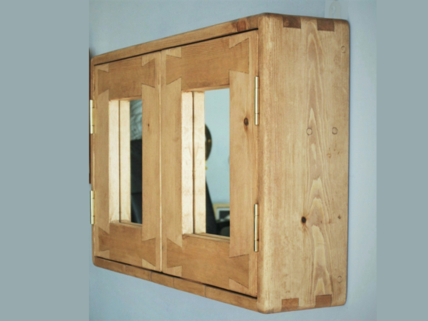 Double mirror bathroom cabinet, our wooden medicine cabinet is custom handmade in Somerset UK from natural wood. Ex side view.