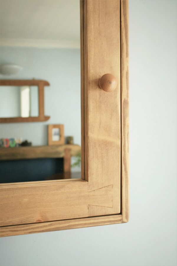 Small bathroom mirror cabinet in rustic natural wood, handmade in Somerset UK, handle view.