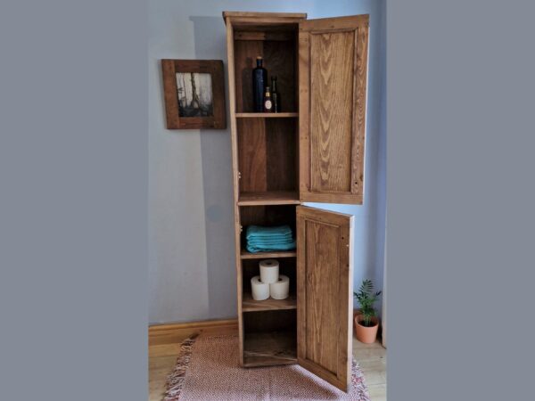 Slim tallboy bathroom cabinet and modern rustic dark wooden towel cupboard custom handmade in Somerset UK, with doors open