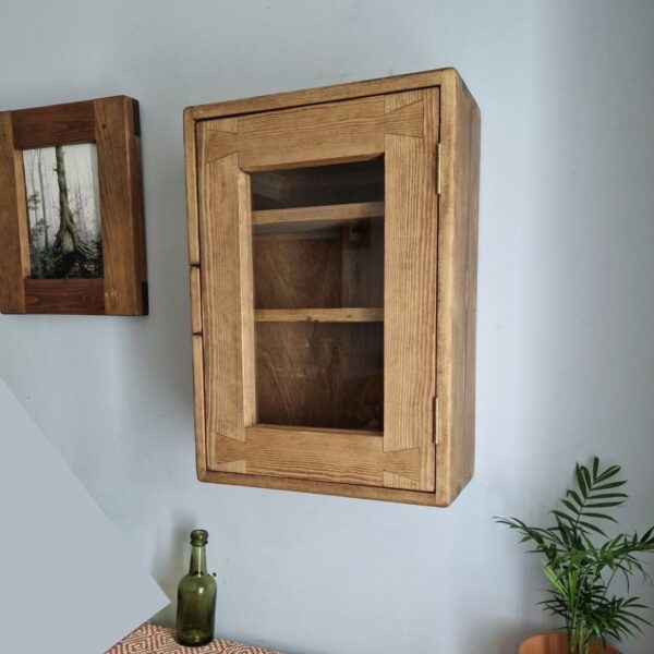 Rustic kitchen display cabinet and dark wood vintage curio cabinet, side view, from Somerset UK