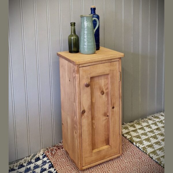Floor standing bathroom cabinet, slim modern rustic wooden storage cupboard, side view, handmade in Somerset UK